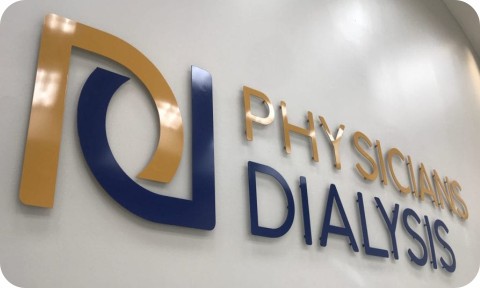 Wall-mounted aluminum business sign with dimensional letters for indoor and outdoor applications